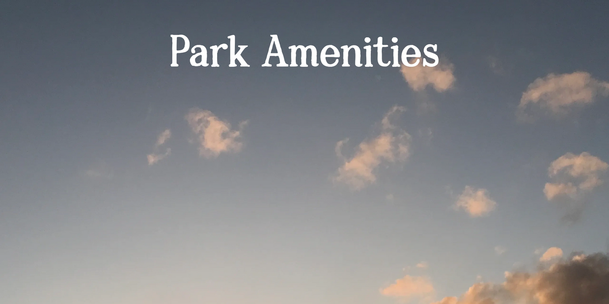 Sunset view with the text 'Park Amenities' above the horizon.