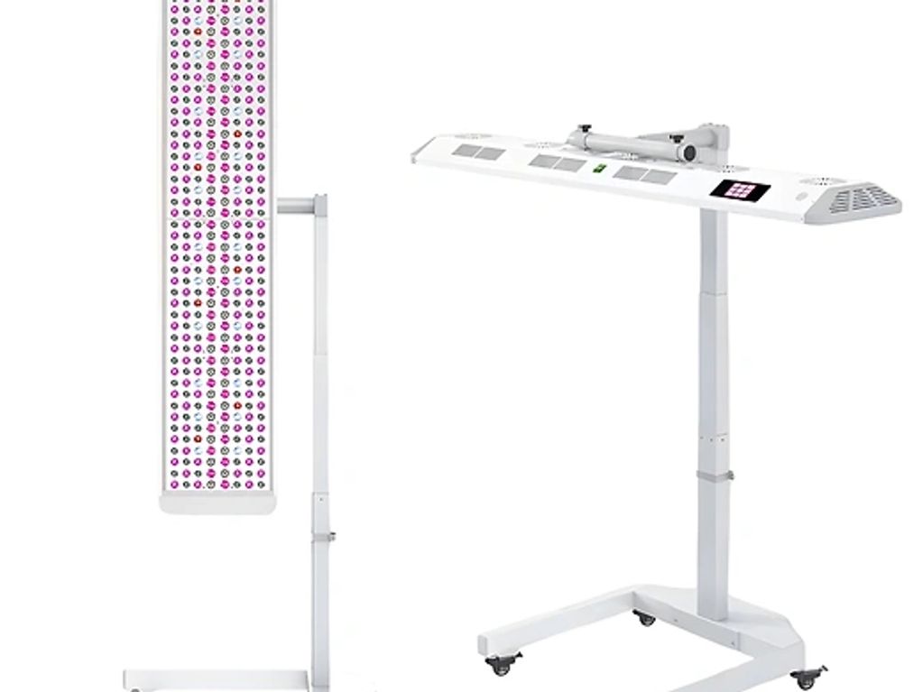 Adjustable LED therapy light panel on rolling stands.