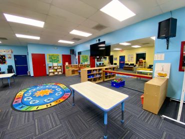 Empty kindergarten classroom with colorful decorations.