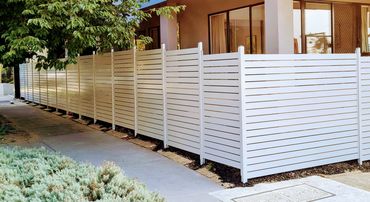 Shale Grey horizontal slat fencing to secure around apartment block 