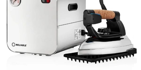 Modern steam iron with a sleek design and wooden handle.