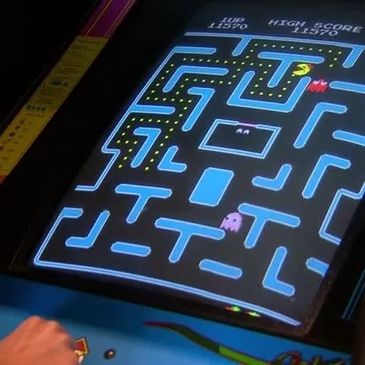 Classic Pac-Man arcade game screen with player score.