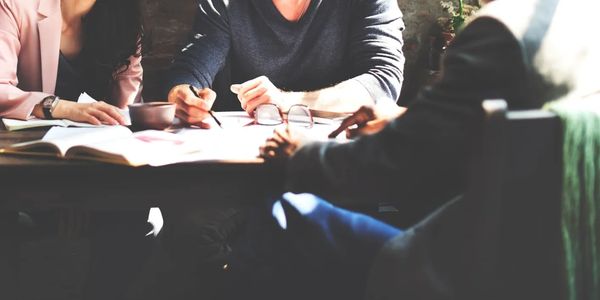 Team working together at table