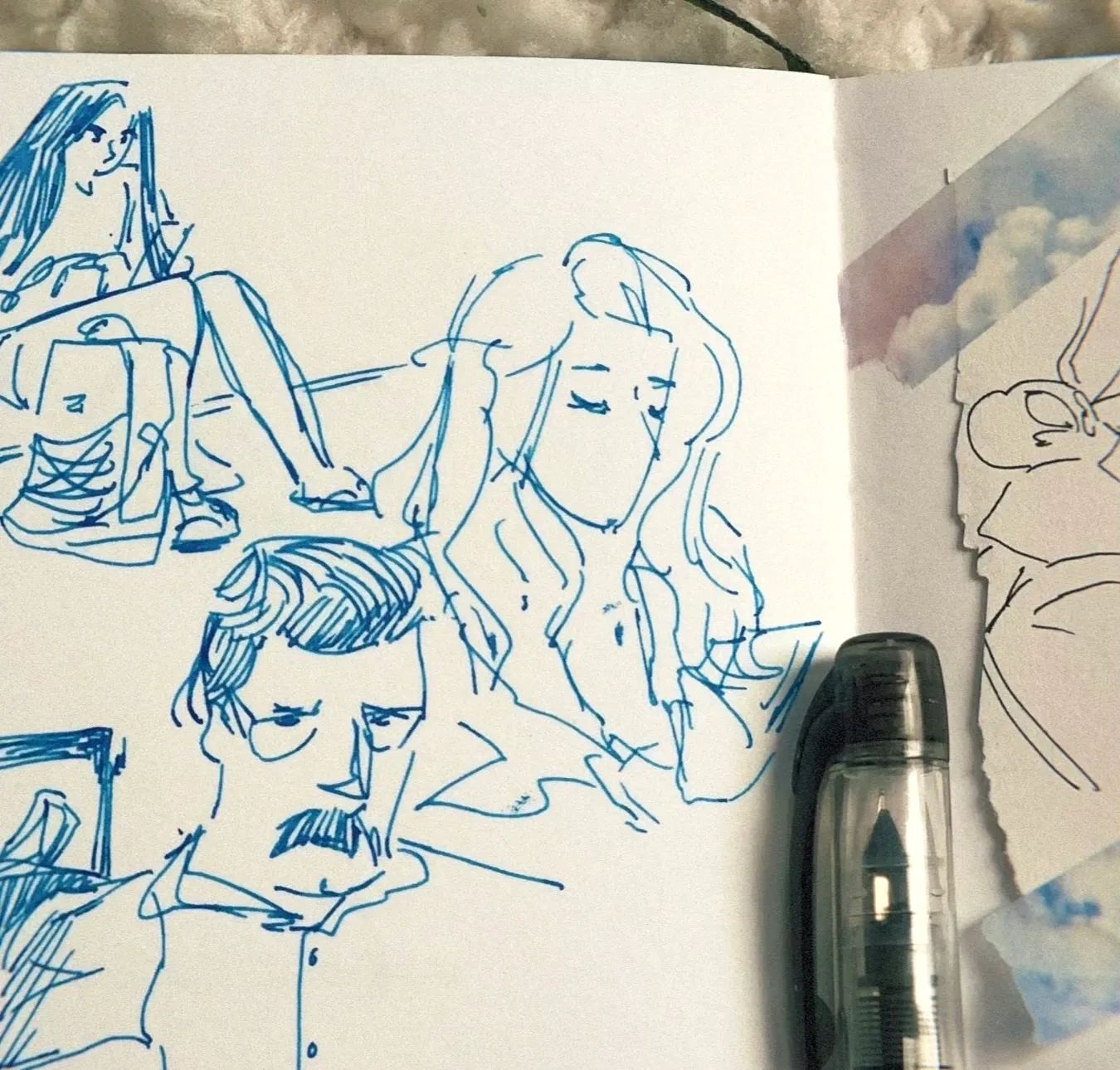 Pen sketches of three people on a white paper.