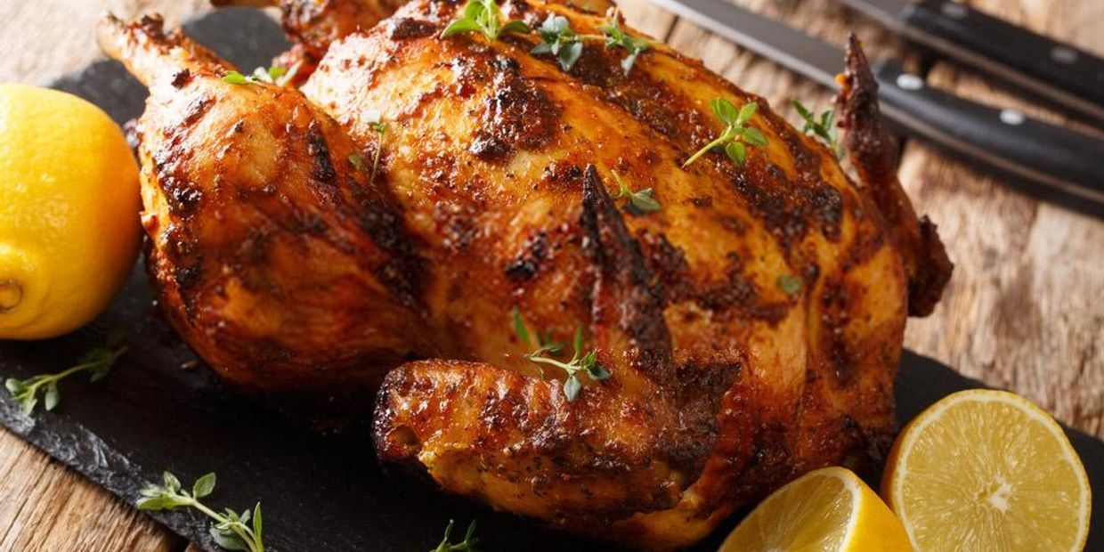 Roasted chicken with lemon and herbs.
