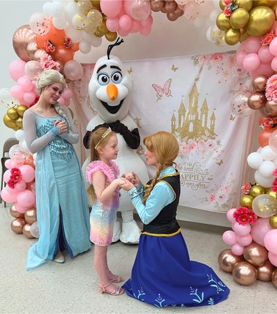 Anna and Elsa performers in St. Louis. Olaf character in St. Louis