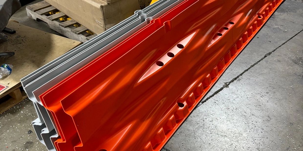 This is a gawk screen, glare screen, temporary traffic screen, or pedestrian panel.
