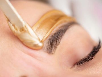 wax eyebrow shaping for defined brows and smooth skin with professional facial waxing