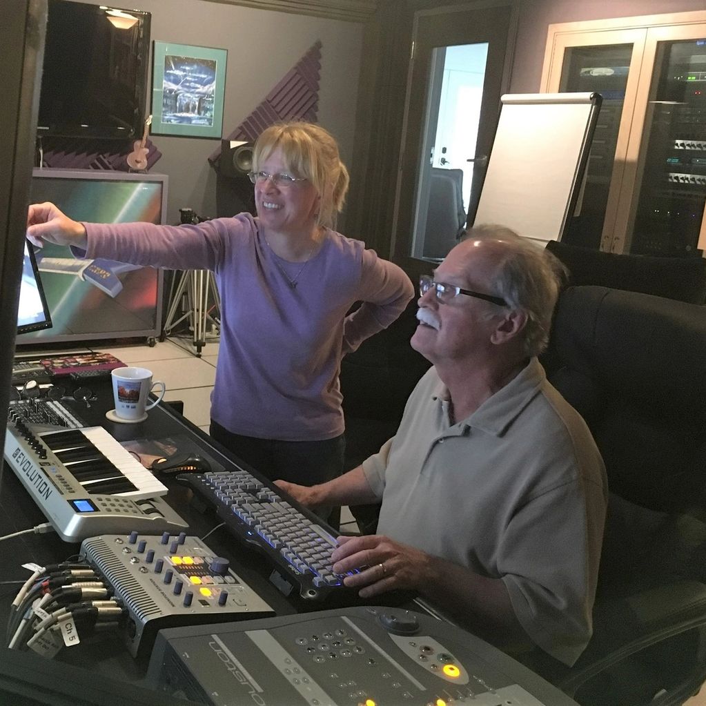 Engineer Jim Corrigan and Laurie at the soundboard.