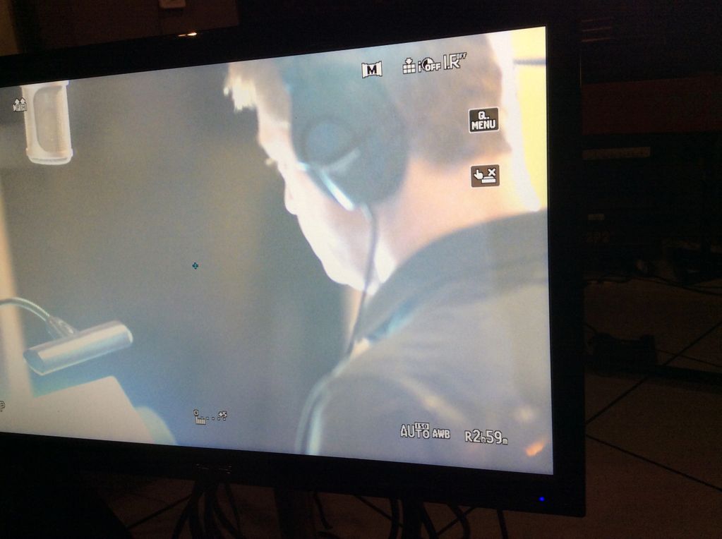 Sean in tv monitor, recording vocals.