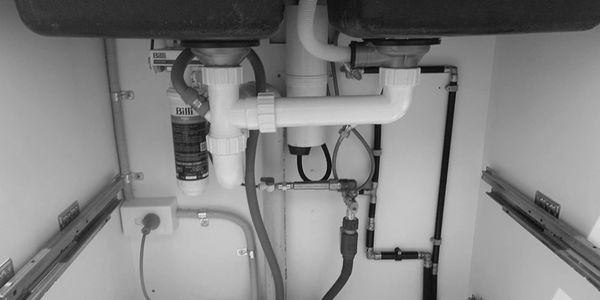 KITCHEN UNDER SINK DRAWER

- plumbing designed to maximise space - to accommodate larger drawer size