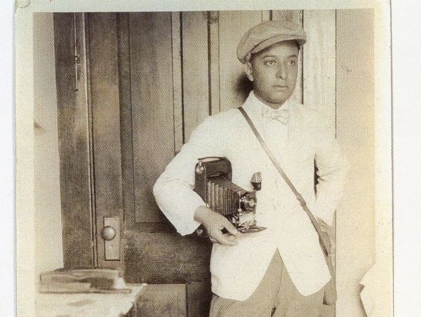 Rob's Grandfather, J.N. Moreno
posing in 1921 (age 25) with his Kodak Folding Bellows Camera