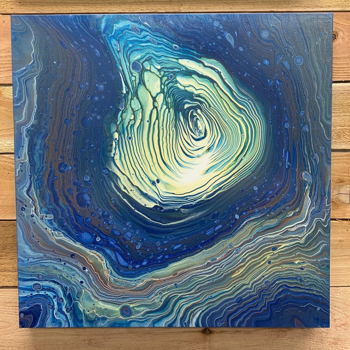 24x24x ring pour on a gallery wrapped canvas.