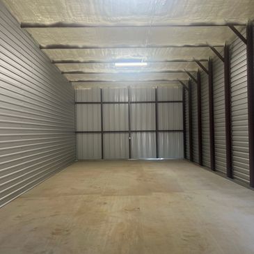 Interior photo of storage unit inside of metal building