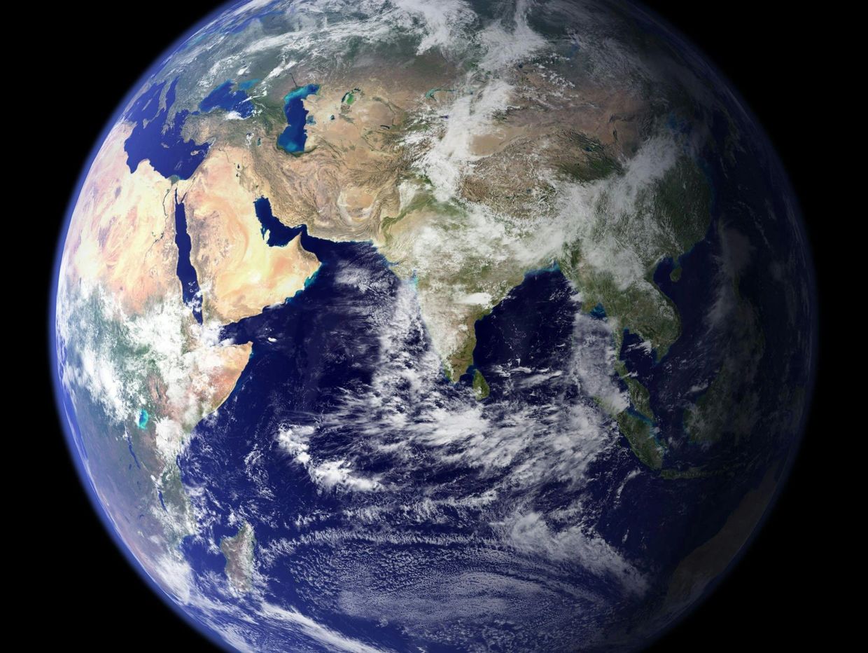 View of Earth from space showing Asia, Middle East, and Indian Ocean.