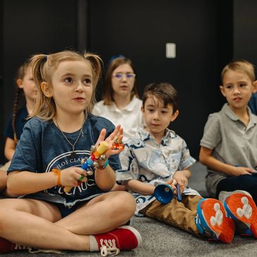 Students at Telos in Music class
