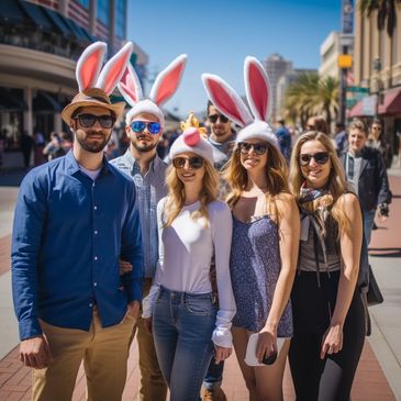 A group adults wearing Easter bunny ears strolling through downtown San Diego during an Hop & Seek