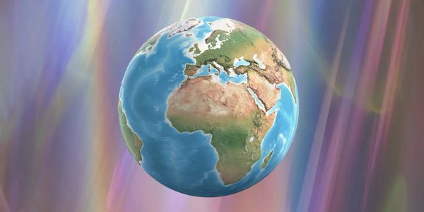 Realistic Earth floating against a colorful, abstract background.