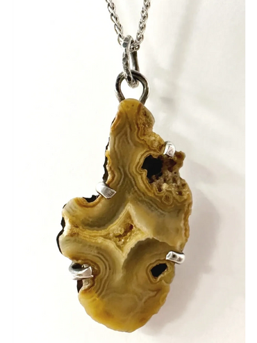  Custom  Handcrafted Pendant 

Polished Crowley Agate Slice set on Stamped .925 Sterling Silver 


