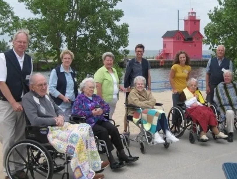 Gary and Eileen Ruiter with orignial volunteers and guests from one of the first homes involved with