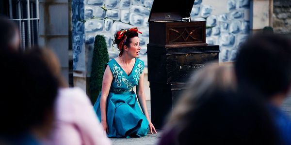 Katie Collier as Beatrice in Much Ado About Nothing for Wild Goose Theatre at Oxford Castle in 2016