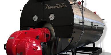 Industrial Powermaster boiler in shiny metal and black with red components.