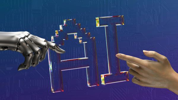 Robot and human hands pointing at 'AI' text.