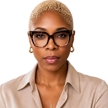 Confident woman wearing tortoiseshell glasses and gold earrings.