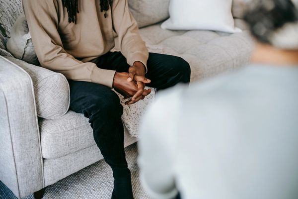 Man having conversation with psychologist