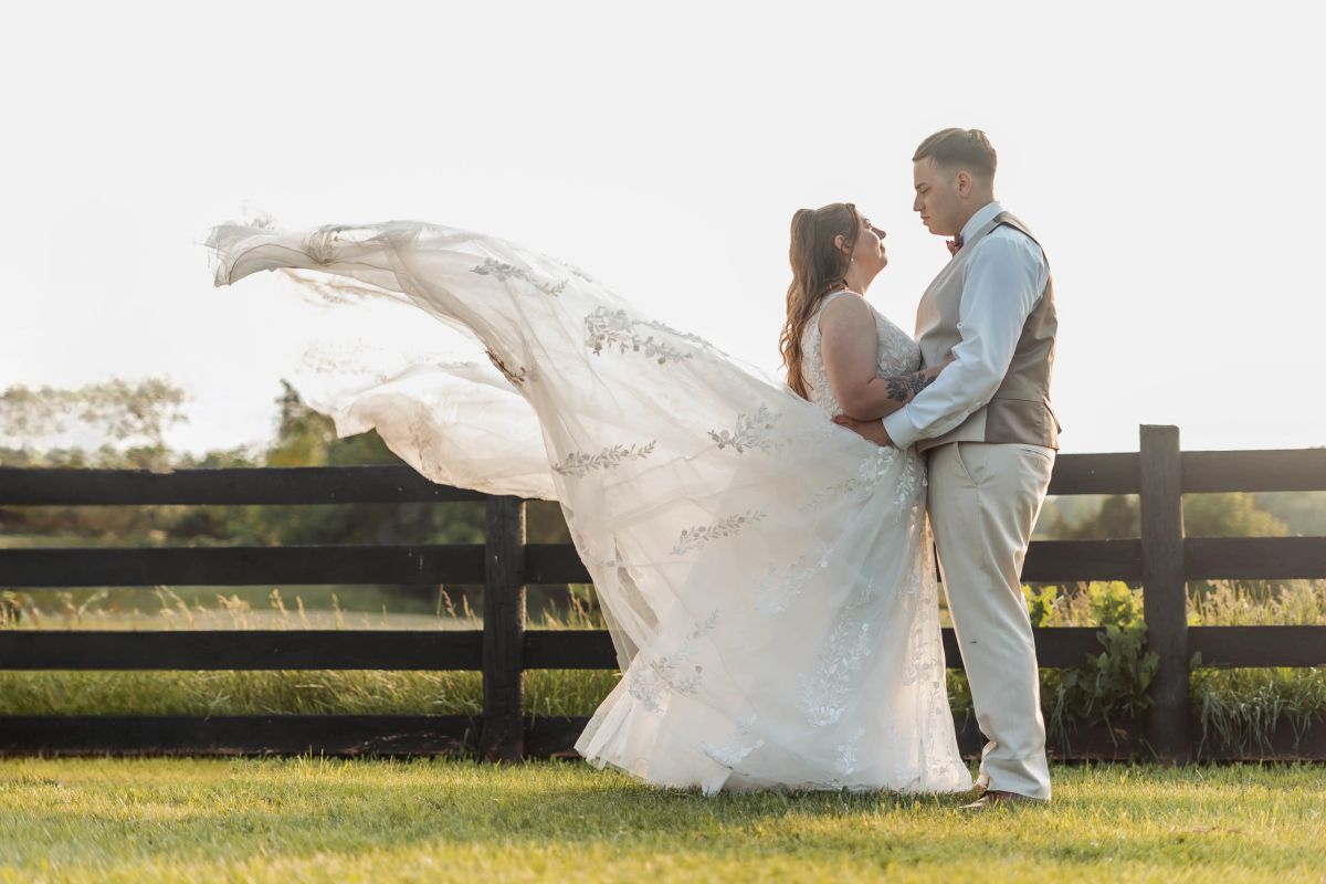 Spring Hill Barn at golden hour — the heart of a 13-acre Virginia farm ready for your wedding day