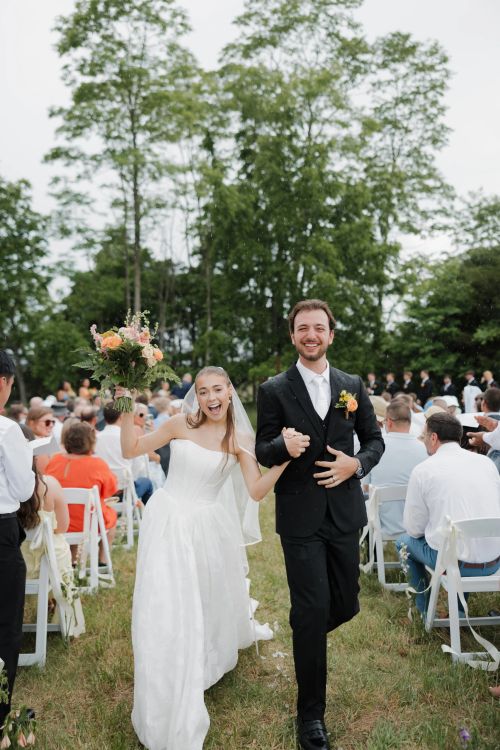 Spring Hill Barn wedding details — table settings, flowers, and candles