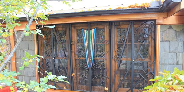 custom security bars doors gates london ontario red iron design custom metal work decorative secure