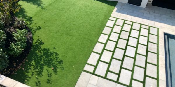 Artificial turf between travertine steps