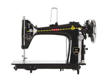 Vintage black USHA sewing machine with decorative gold detailing.