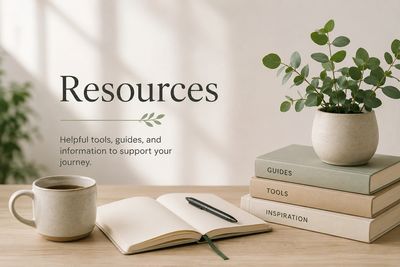 Workspace with resources including books, a plant, and a coffee cup.