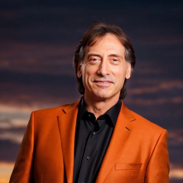 A man in an orange suit