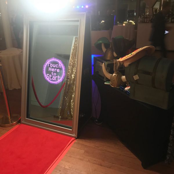 The Mirror Me selfie photo booth with custom templates and red carpet experience.  Open air photo