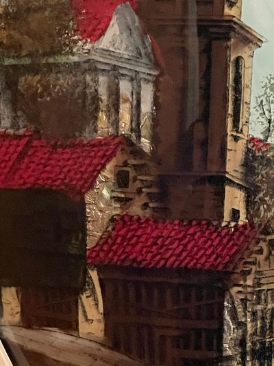 Painting of buildings with red tiled roofs.