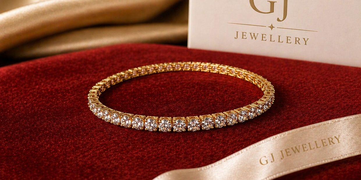 Elegant gold and diamond bracelet on red velvet with GJ Jewellery branding.