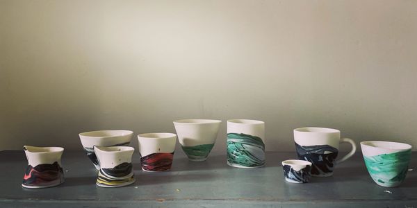 Laura Murphy Ceramics marbled landscapes vessel collection. 