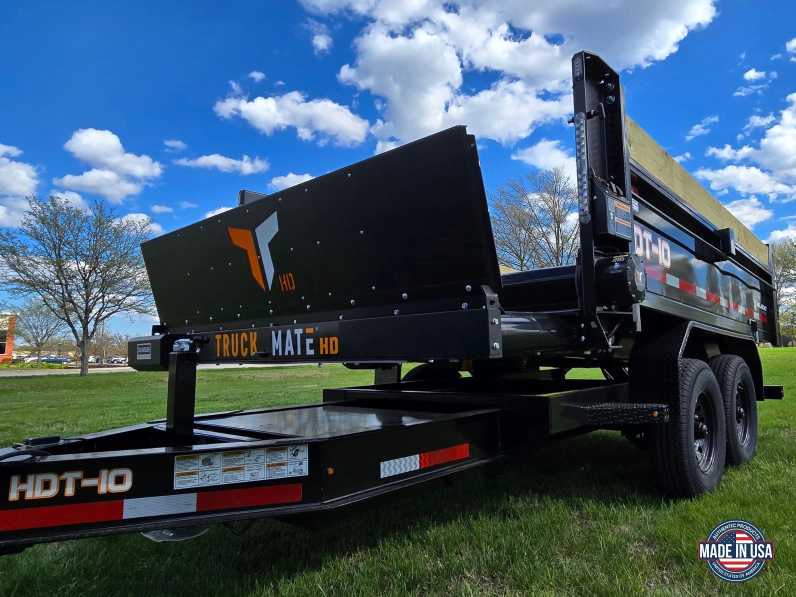 Dump trailer with a Truck Mate HD on the front Mulch moving machine Landscaping trailer Smartgate