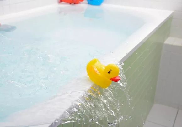 Blocked bath which is overflowing