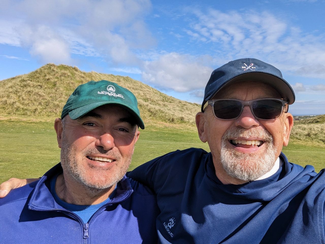 James was integral in TD's monumental (as well as somewhat suspect) Stableford win at the 2024 Carne International Members Tournament.  James would say "Where ya aimin'?"  TD would say "Up there on the right."  James: "Where on the right?" TD: "Right side of the green."  James: "Where on the right side?"  TD:  "The brown spot."  James:  "Where at on the brown spot?"  TD: "right side of the brown spot."  James:  "Where at on the right side of the brown spot?"...finally concluding with James saying "Good, you know it's going to kick to the left anyway."  TD hopes you get the drift.  James was definitely an "aim small - miss small" kind of caddy.  He was just one of those guys with whom TD wishes he'd had a 20 years friendship instead of 3-4.