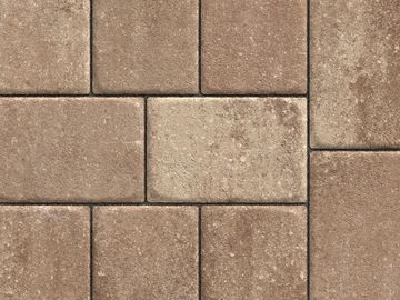 Brown rectangular stone tiles arranged in a pattern.