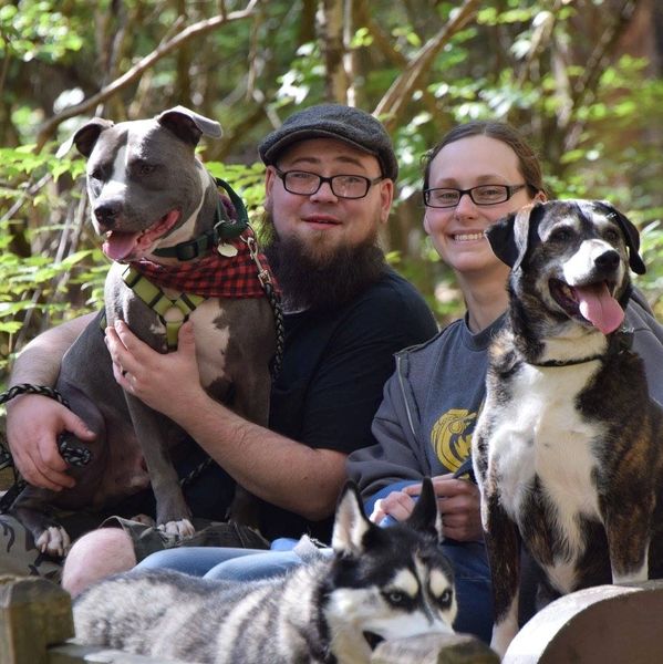 Jayni with her husband and dog-family