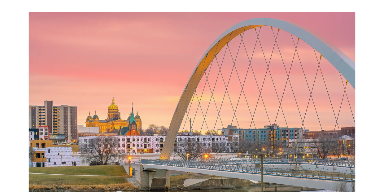 Des Moines small business HR with an image of Des Moines with new buildings being built for growth. 