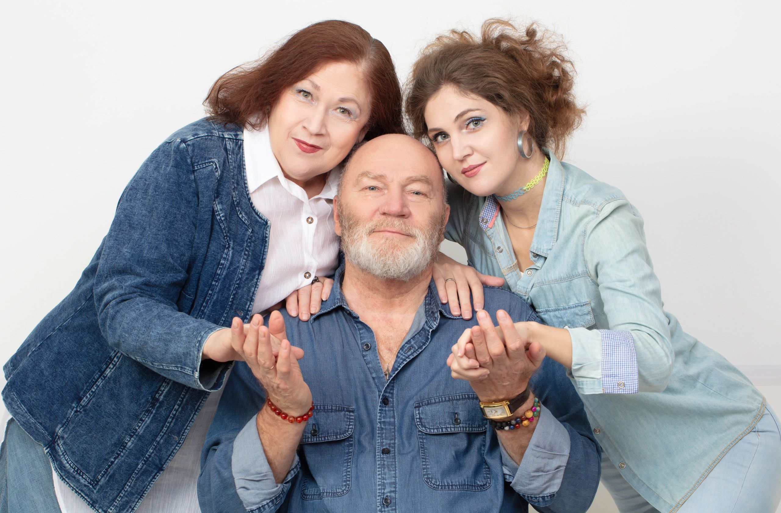 Family portrait of parents with adult daughter