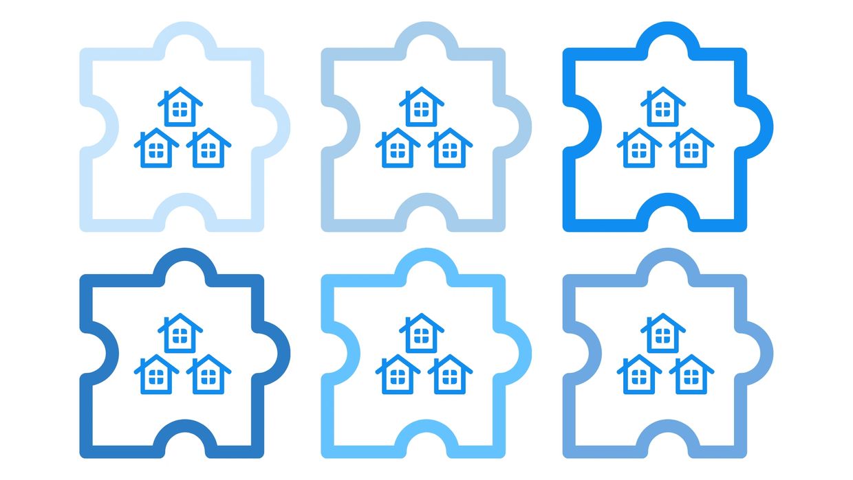graphic of a cluster of homes within six puzzle pieces being pieced together 