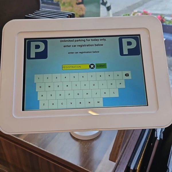 Digital parking registration kiosk for unlimited parking today.
