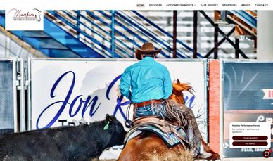 Rodeo cowboy on horseback guiding a calf in an arena.